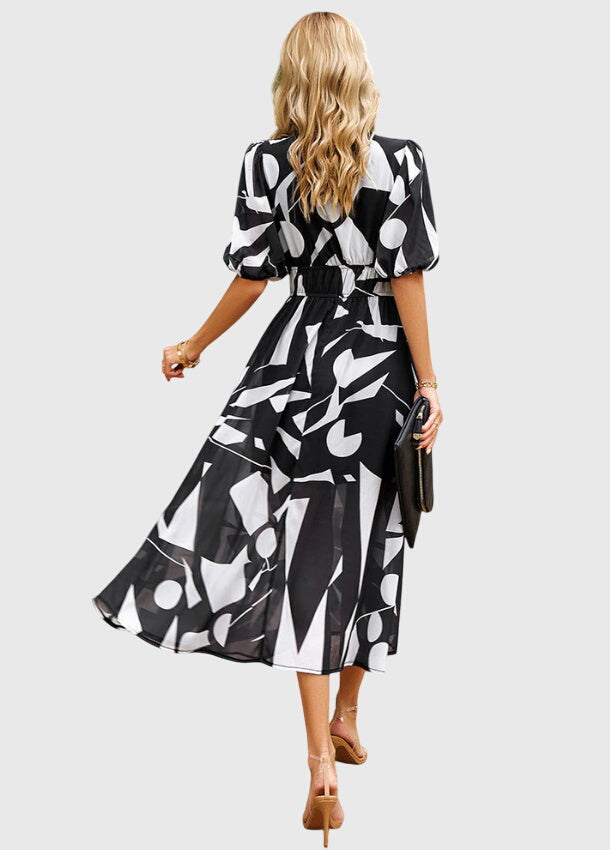 Merlin™ | Imarteleva Kukallinen Midi Mekko